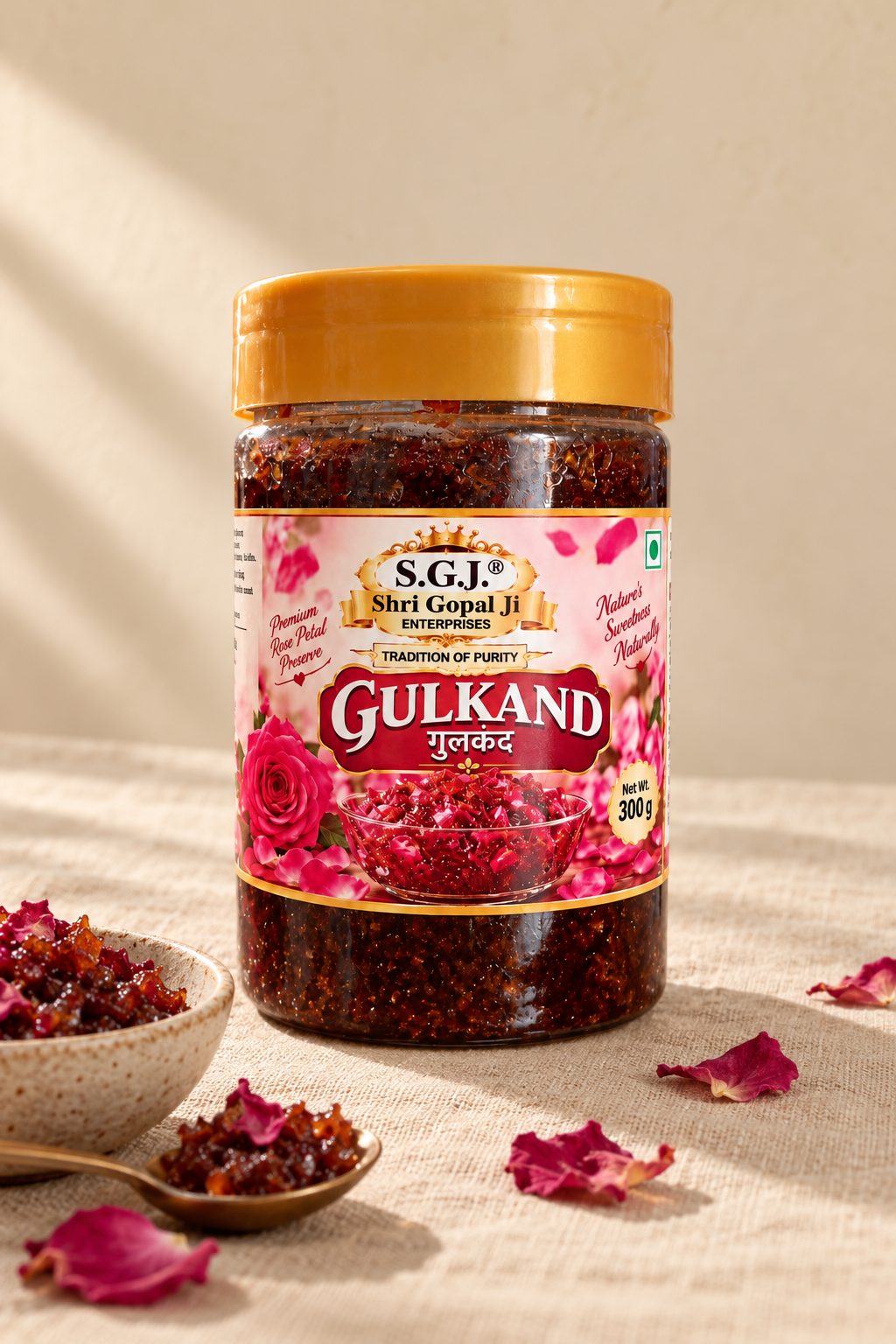 A jar of Shri Gopal Ji gulkand on linen, with rose petals and a bowl of preserve